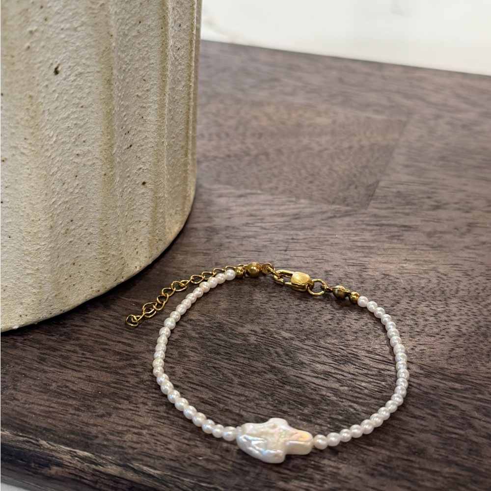 Elegant Pearl Cross Bracelet with Gold Accents